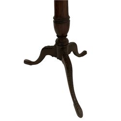 20th century carved oak tilt top occasional table, the profusely carved tilt top, over one turned column, leading into three splayed supports W77cm