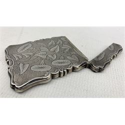 Mid Victorian silver card case of rectangular form, engraved to both sides with bindweed against an engine turned ground and scroll borders, hallmarked Nathaniel Mills, Birmingham 1849,  approximate gross weight  2.19 ozt, 10cm x 17cm 
