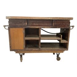 Early 20th century two-burner gas range, rectangular copper top, fitted with single drawer and shelves, on castors