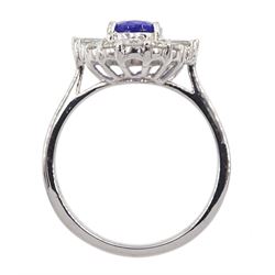 18ct white gold oval tanzanite, round and tapering baguette diamond cluster ring, stamped 750, tanzanite approx 1.30 carat, total diamond weight approx 0.60 carat