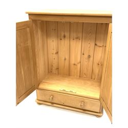 Solid pine tallboy, fitted with a  double cupboard over single drawer, raised on bun supports W89cm, H120cm, D45cm