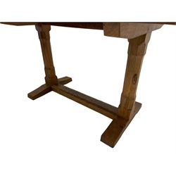 Rabbitman - oak dining table, rectangular adzed top with rounded corners, twin octagonal pillar supports on sledge feet joined by floor stretcher, carved with rabbit signature, by Peter Heap of Wetwang 