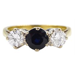 18ct gold three stone sapphire and round brilliant cut diamond ring by Mappin & Webb Ltd, London 1978, total diamond weight approx 0.55 carat