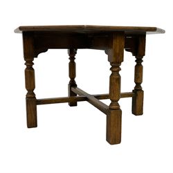 Early 20th century oak coffee table, octagonal top on turned supports united by X-stretchers