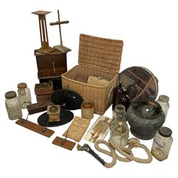 Wicker ware basket with hinged lid W60cm, containing two amber glass bottles, cut glass dressing table pieces, and other glass bottles, early 20th century smokers cabinet in oak, large copper jardiniere, lacquer boxes, coffee grinder, lantern, mirror with rope hanger etc. 