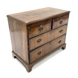  18th century walnut chest of two short and two long drawers, raised on shaped bracket supports, W103cm, H85cm, D54cm  