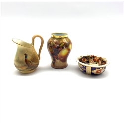 Royal Worcester miniature hand-painted jug decorated with a Pheasant in a woodland setting dated 1912, H6.5cm, a Kingsley Enamels limited edition miniature baluster vase, painted with a still life of fruit by N. Creed together with a miniature Davenport Imari pattern bowl (3)