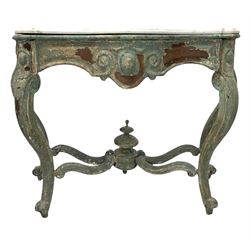 20th century French hardwood console table of serpentine outline, moulded white variegated marble top over frieze with shaped apron raised on scrolled cabriole supports united by stretchers, finished in blue and oxide crusty paint, W130cm, H92cm, D52cm