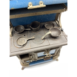 American salesman's sample stove by Karr Range Company, nickel-plated steel-framed stove with blue enamelled finish, cast iron range top with six burners and five various sized pans, H56cm, W33cm, D22cm