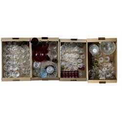 Four boxes of glassware to include cut glass drinking glasses, coloured glass etc 