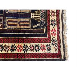 Baluchi ivory and indigo ground prayer rug, the field with architectural design surrounded by a guarded border with repeating star motifs