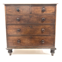 Early 19th century oak chest fitted with two short and three long drawers, raised on turned supports,  W105cm, H107cm, D55cm