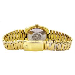 Omega Seamaster ladies gold-plated and stainless steel automatic wristwatch, champagne dial with baton hour markers and date aperture, on original gold-plated strap