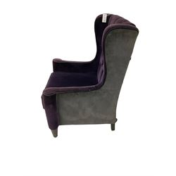 Regency style armchair, upholstered in purple and contrasting grey with black piping and button back, on turned and tapered foot supports 