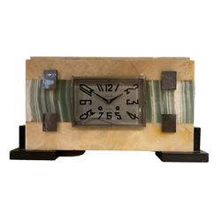 G.Blond - French Art Deco 8-day marble cased mantle clock, in a rectangular case with panels of contrasting variegated marble, with a conforming rectangular chrome bezel, silvered dial with Arabic numerals and baton hands, two train count wheel movement striking the hours on a bell. With key and pendulum.
