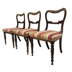 Set of six Victorian rosewood dining chairs, foliate carved centre rail over striped upholstered seat, raised on turned and lapped carved supports