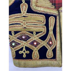Afghan needlework waistcoat, circa. 1970, in blue velvet with gold and red applied decoration, with tartan lining, L50cm x W45cm