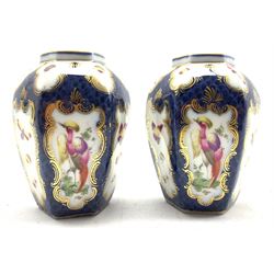 Pair of Paris porcelain hexagonal vases, decorated with panels of birds and insects on a scale blue ground and with 'Worcester' hatched square mark, probably Samson of Paris  H9.5cm