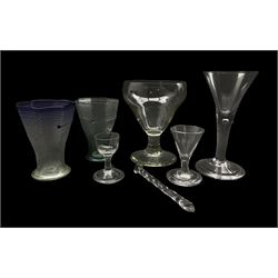 Large 19th century glass rummer on plain stem with ogee bowl H15cm, 19th century glass with tear drop stem and folded foot, two small glasses with folded foot, two octagonal glasses of tapering design with spun coloured decoration and a glass swizzle stick (7)