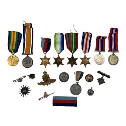 Group of WWI and WWII medals and other items, including WWI Victory Medal and 1914-1920 British War Medal with ribbons, awarded to George Henry Mynett, Gunner, Royal Garrison Artillery; six WWII medals, comprising 1939-1945 Star, Atlantic Star, Pacific Star, France and Germany Star, and two 1939-1945 War Medals, with ribbons, together with various badges, etc