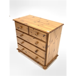 Modern polished pine chest fitted with two short and three long drawers, raised on turned bun supports, W84cm, H77cm, D47cm
