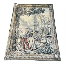 Continental machine made tapestry panel, of a hunting scene within a floral border 