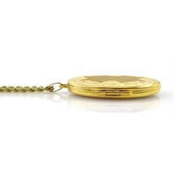 Gold hinged locket pendant, on gold rope twist necklace, both 9ct