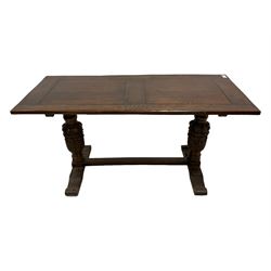 19th century oak dining table, rectangular top raised on lobe and foliate carved and turned baluster end supports, fluted sledge feet joined by stretcher