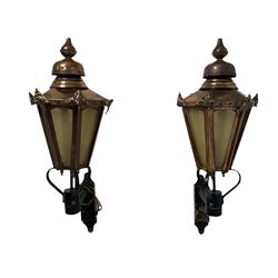 Pair Victorian style copper lanterns, fitted with wall mounts, tapering hexagonal form with decorative moulded mounts, finial toppped