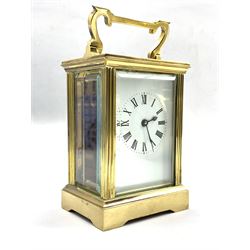 20th century French brass carriage time piece clock, with bevel glazed panels, white enamel dial with Roman chapter ring W8cm