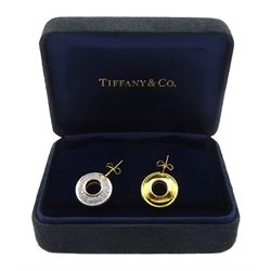 Pair of Tiffany & Co 18ct gold and platinum reversible Magic Disk stud earrings by Paloma Picasso, the platinum disks with pave set diamonds, in original box