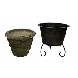 Composition stone urn planter decorated with swags, (D52cm) together with a cauldron planter on wrought scrolled tripod base (D54cm)