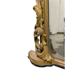 19th century giltwood overmantel mirror, the moulded frame decorated with carved scroll and foliate mounts