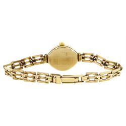 Accurist 9ct gold ladies quartz wristwatch, on 9ct gold bracelet, hallmarked