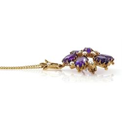 Gold amethyst and pearl pendant/brooch, on gold necklace, both tested 9ct, in Hugh Rice box