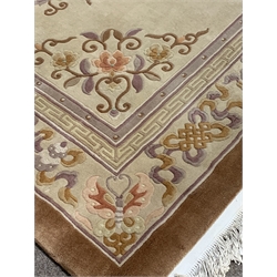  Chinese beige wool ground carpet, central medallion surrounded by stylized butterflies and vines, guarded border, 275cm x 390cm  