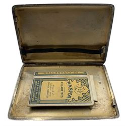 Silver engine turned cigarette case Birmingham 1934, christening mug with loop handle H7cm Birmingham 1903, two pairs of sugar tongs and a pair of plated tongs 