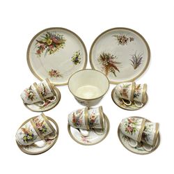 Victorian Worcester part tea set painted with sprays of leaves and flowers within a jewelled border comprising ten cups, thirteen saucers, slop bowl and two cake plates