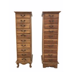 Two 20th century hardwood tall chests fitted with ten drawers, W41cm, H136cm, D46cm