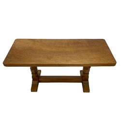 Mouseman - oak coffee table, rectangular adzed top on octagonal pillars, sledge feet joined by floor stretcher, carved with mouse signature, by the workshop of Robert Thompson, Kilburn 