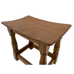 'Mouseman' oak joint stool, dished top on four octagonal supports joined by stretchers, carved with mouse signature, by Robert Thompson of Kilburn