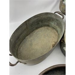 Victorian copper two handled cooking pan of lozenge shape 66cm x 50cm, an oval pan 41cm, another 45cm and a circular pan 39cm, three initialled 'B' (4)