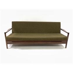 Vintage mid 20th century rosewood sofa bed by Cintique, back and seat cushion upholstered in green fabric, with shaped open arms, raised on moulded square supports - in the manner of Guy Rogers 'Manhattan' range