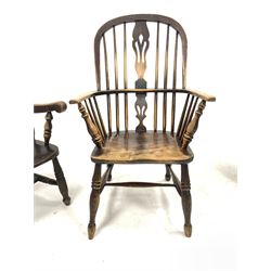 19th century elm and ash windsor armchair, with hoop spindle and splat back, saddle seat, raised on turned supports united by stretcher, (W61cm) together with another 19th century Windsor arm chair (W60cm)