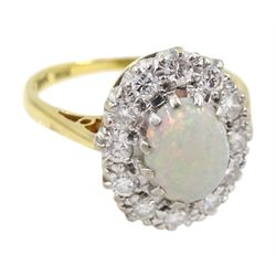 18ct gold oval opal and diamond cluster ring, hallmarked