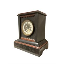 French - 8-day late 19th-century mantle clock in a Belgium slate case, with a flat top, rouge marble relief and incised chasing on a stepped plinth, two-part enamel dial with a visible dead-beat brocot escapement, Roman numerals, minute track and steel spade hands, two train movement striking the hours and half-hours on a bell. With pendulum.