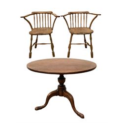 Pair of smokers bow armchairs, the spindle back over saddle seat, raised on turned supports, together with mahogany tripod table