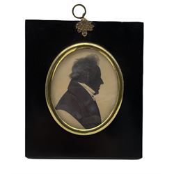 19th century oval silhouette portrait of a gentleman with highlights 9cm x 8cm in ebonised frame