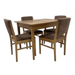 Gordon Russell - mid-20th century teak extending dining table, rectangular top with concealed integrated leaf, on tapering supports (W108cm D78cm H77cm); and matching set of four dining chairs, back and seat upholstered in patterned fabric (W48cm H85cm)