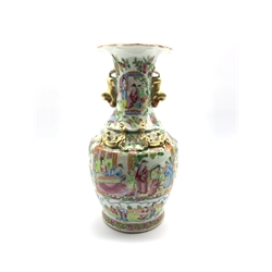 19th century Chinese Canton Famille Rose vase of baluster form, the exterior sides applied with gilt dragons and similar Dog of Fo handles, typically enamelled with court scenes, H33cm  
